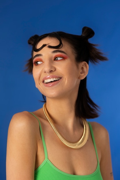 Free photo young woman wearing chain necklace