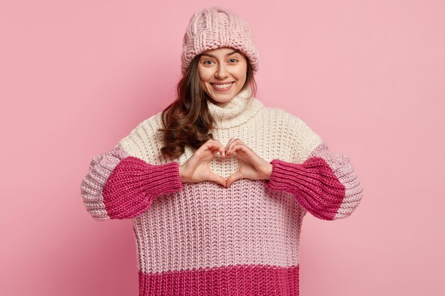 Young woman wearing colorful winter clothes