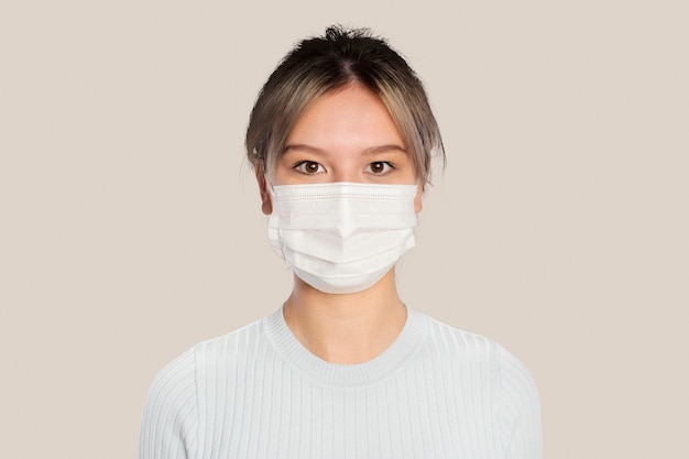 Young woman wearing a face mask in the new normal