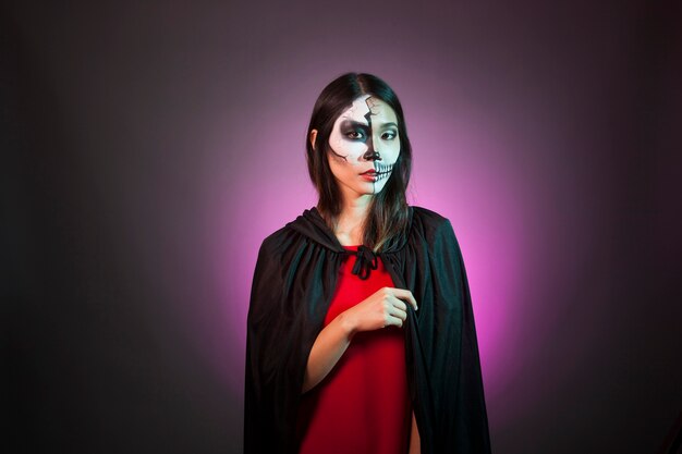 Young woman wearing halloween costume