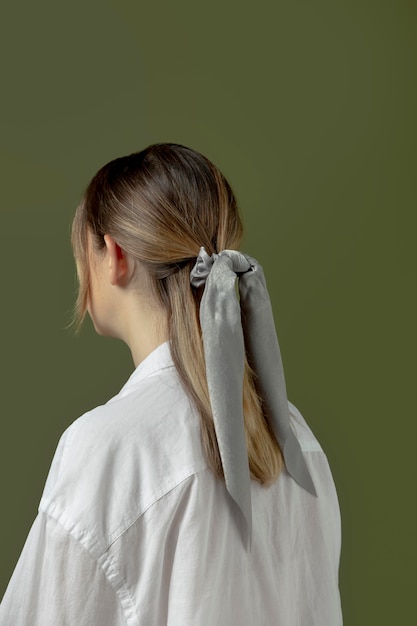 Young woman wearing a handkerchief as a hair accessory
