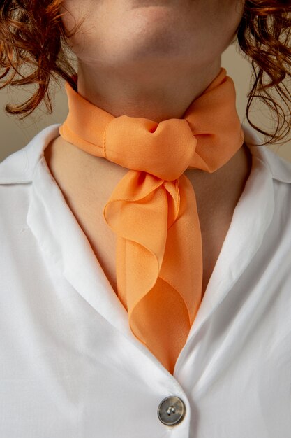 Young woman wearing a handkerchief as a neck accessory