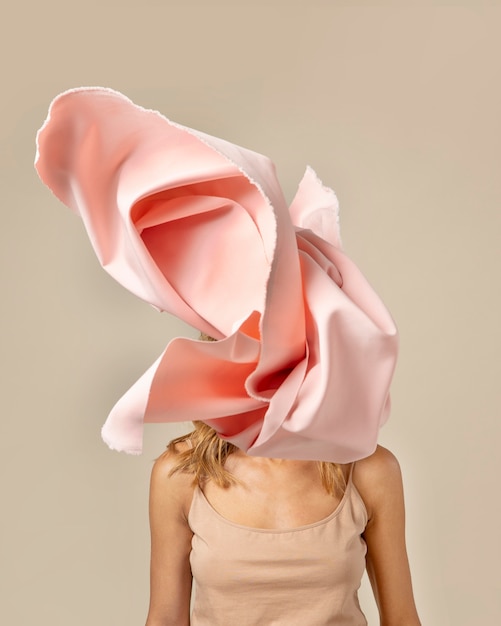 Free photo young woman wearing a handkerchief on her face