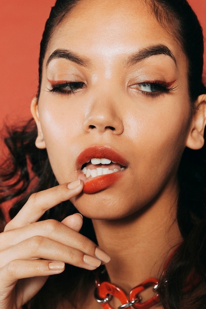 Free photo young woman wearing make-up portrait