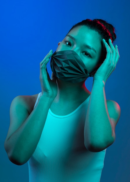 Young woman wearing mask