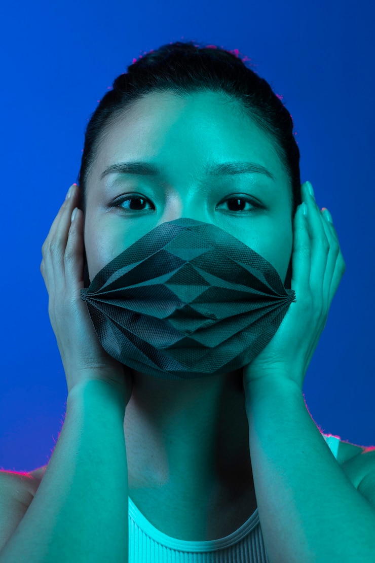 Free Photo young woman wearing mask