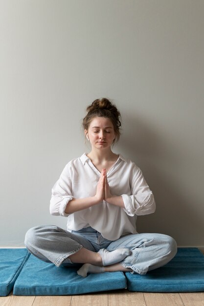 Young woman wearing messy bun hairstyle