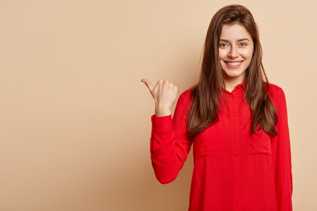 Young woman wearing red shirt