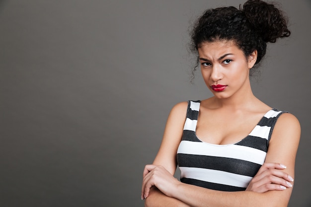 Young woman wearing striped shirt