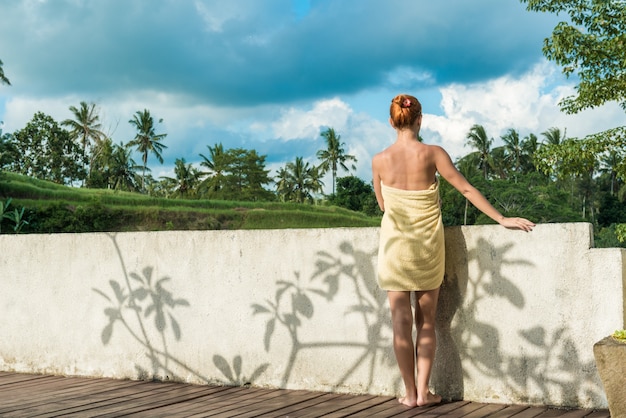 Young woman wearing towel