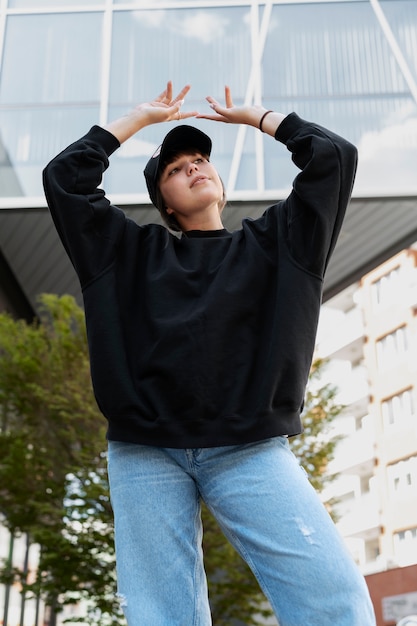 Young woman wearing trucker hat