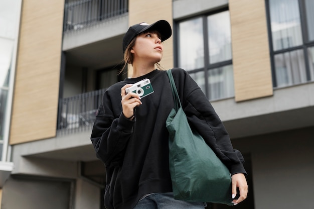 Young woman wearing trucker hat