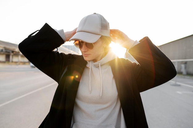 Young woman wearing trucker hat