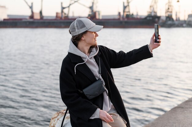 Young woman wearing trucker hat