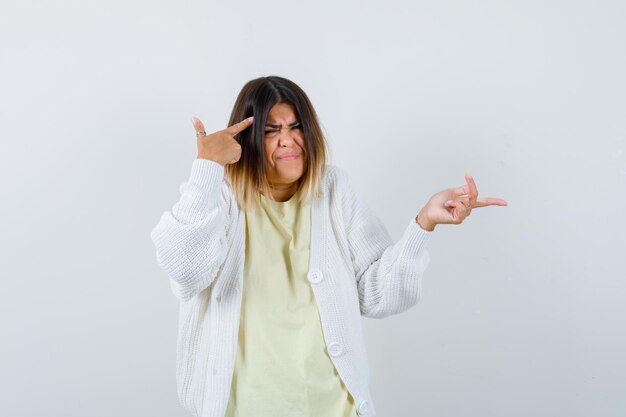 Young woman wearing a white cardigan