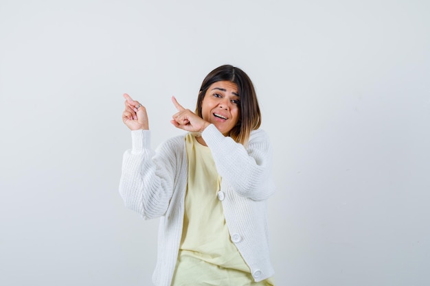 Free photo young woman wearing a white cardigan