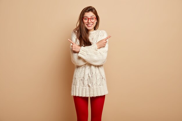 Young woman wearing white sweater