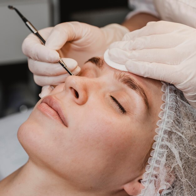 Young woman at the wellness center during a skin treatment