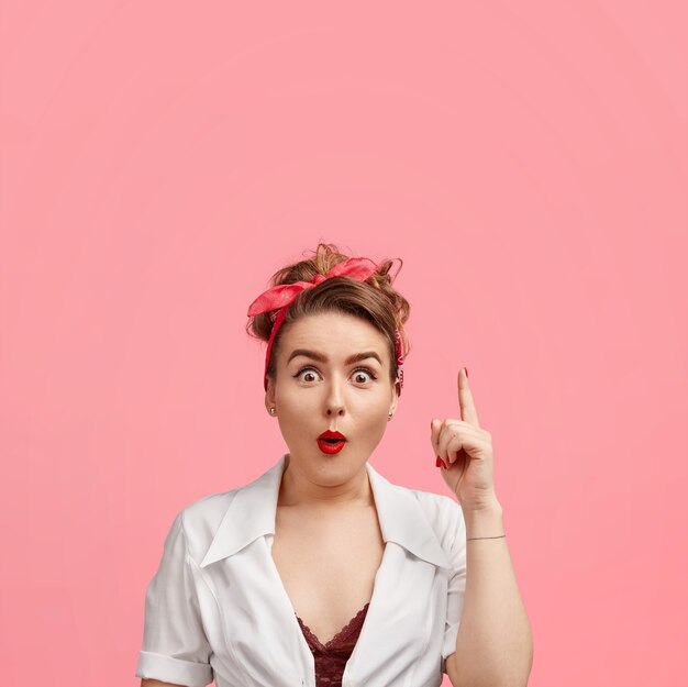 Young woman with bandana and white shirt