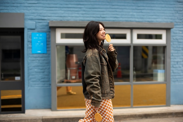 Young woman with cookie