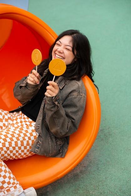 Young woman with dalgona cookie