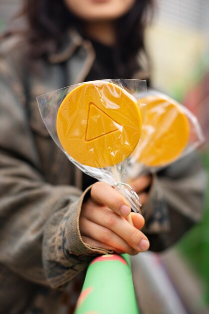 Young woman with dalgona cookies