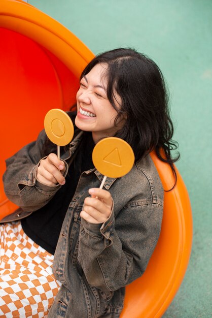 Young woman with dalgona cookies