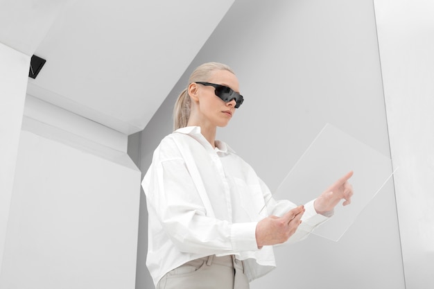 Young woman with digital glasses