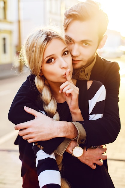 Free photo young woman with finger on lips