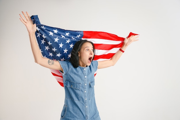 Young woman with the flag of United States of America