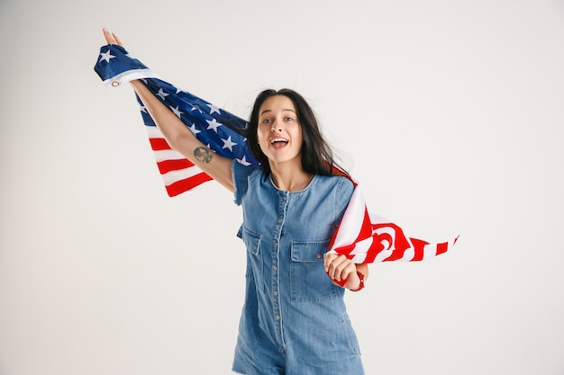 Young woman with the flag of United States of America