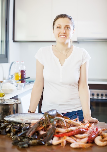 Young  woman with fresh marine products