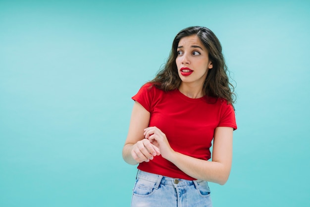 Young woman with funny face and copy space