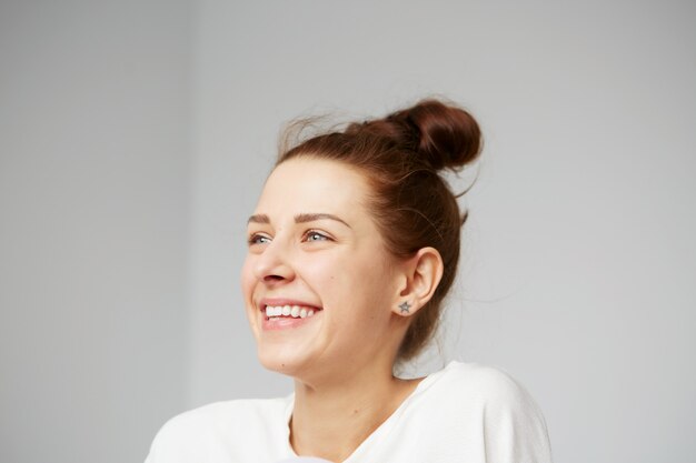 Young woman with hair in bun