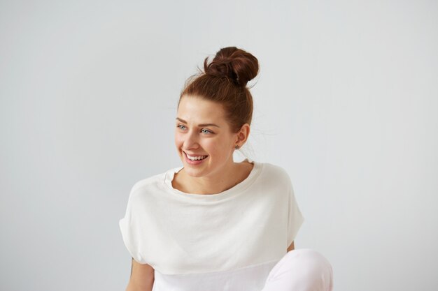 Young woman with hair in bun