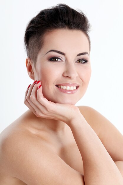 Young woman with haircut and evening makeup