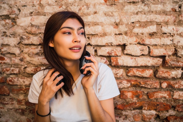 Young woman with headphones.