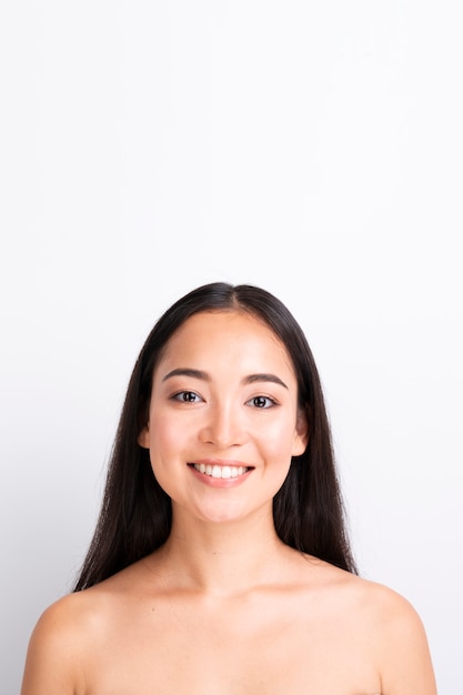 Young woman with healthy skin close up portrait