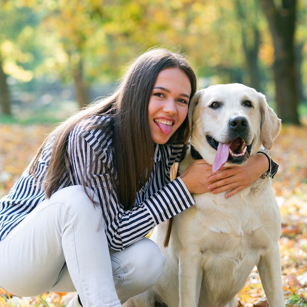 Young woman with her lovely dog