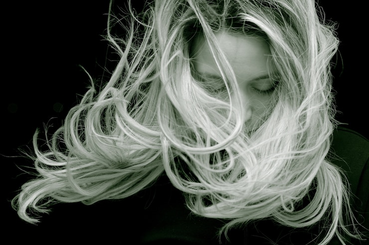 Free Photo young woman with long hair posing