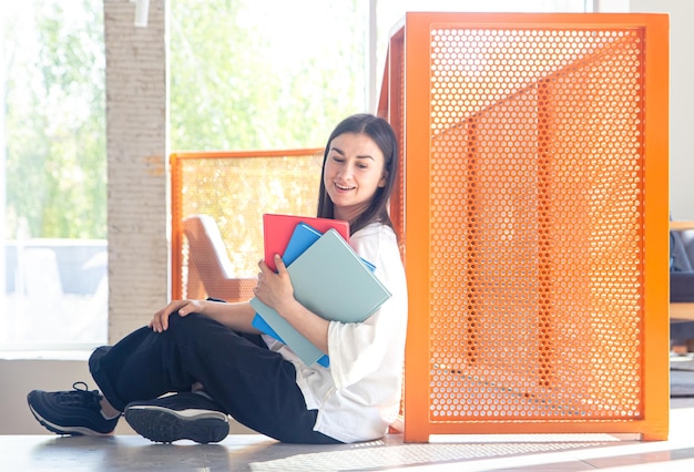 young-woman-with-notebooks-study-teachin