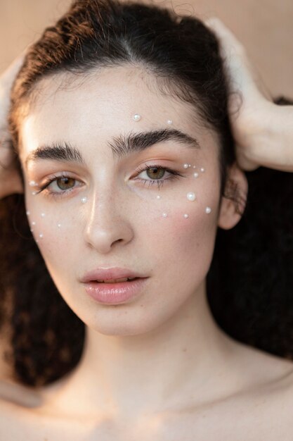 Young woman with pearls make up