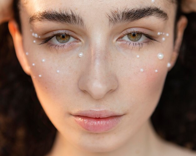 Young woman with pearls make up