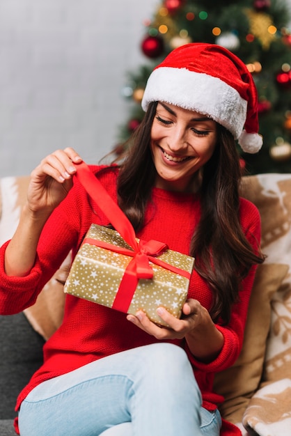 Young woman with present box