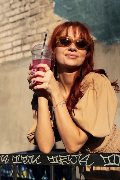 Young woman with red hair smiling