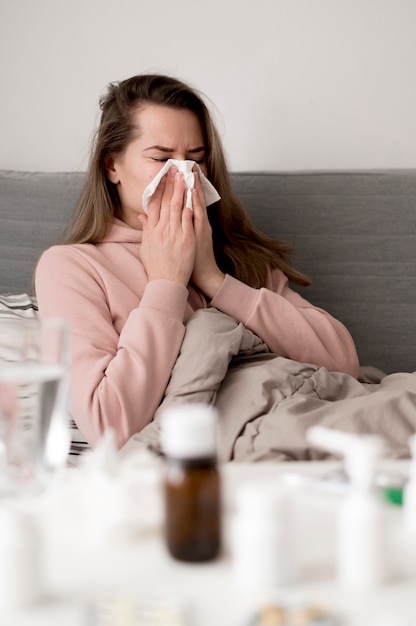 Young woman with runny nose