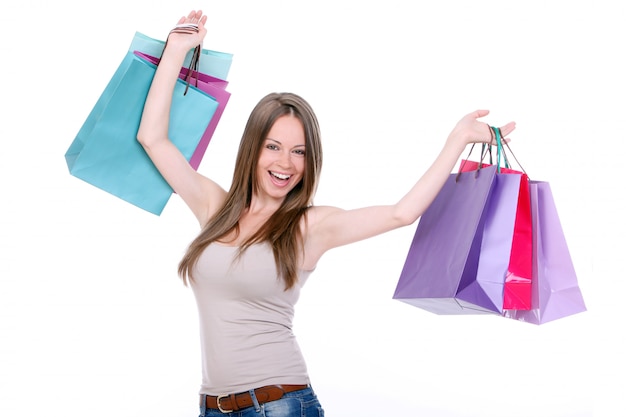 Free photo young woman with shopping bags