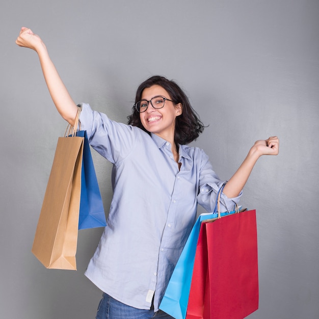 Young woman with shopping bags 