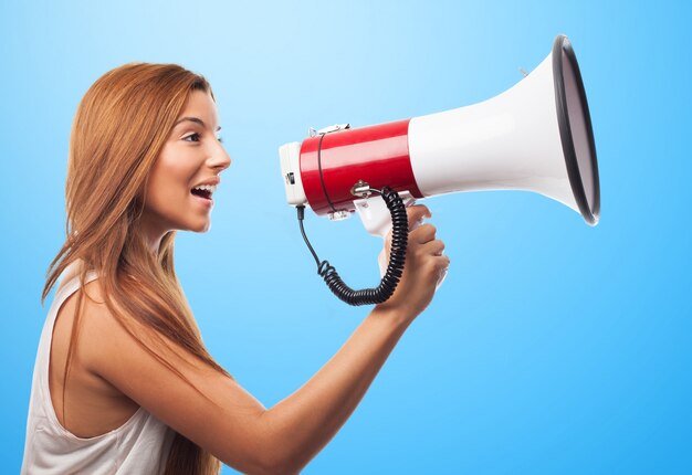 Young woman with speaker