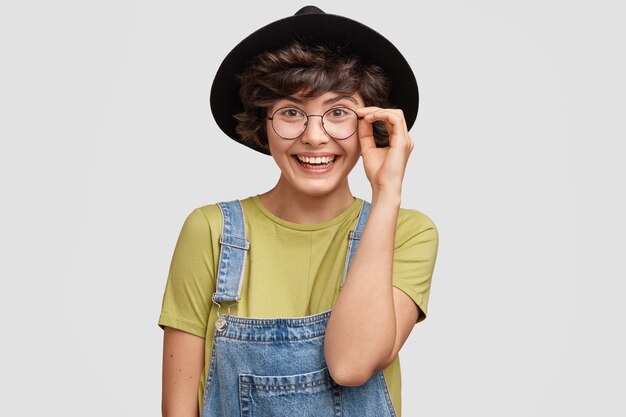 Young woman with stylish black hat